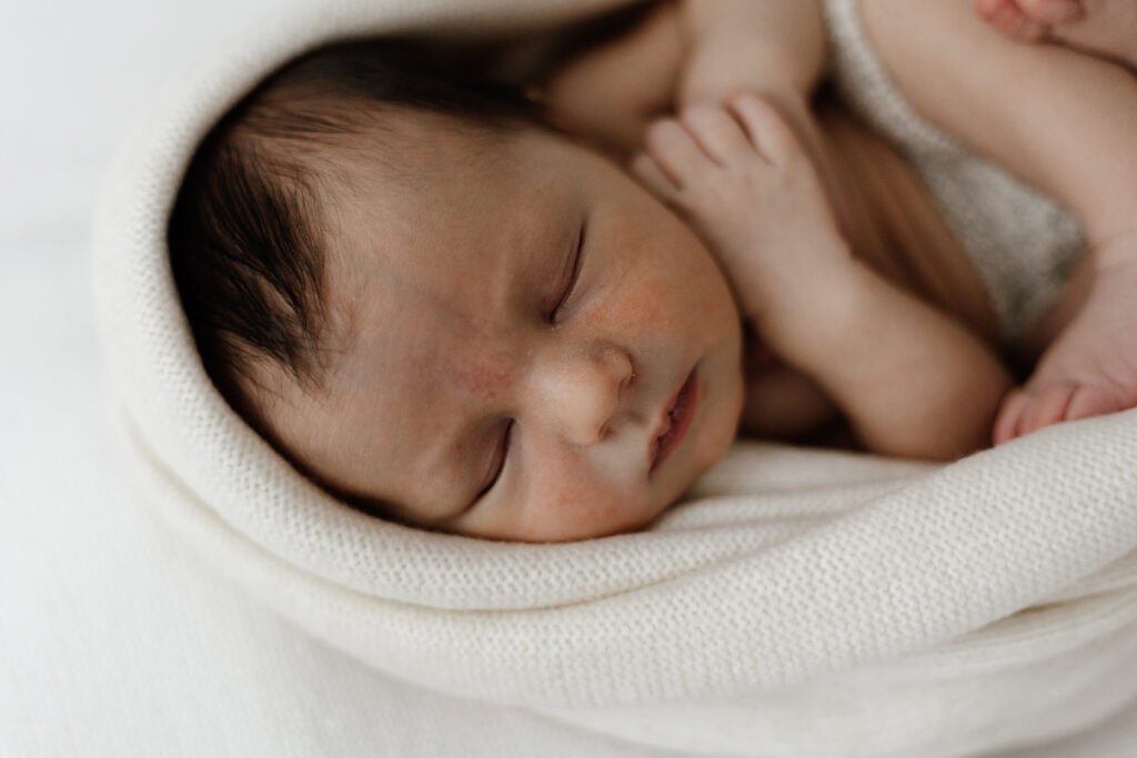 relaxed newborn during newborn photography session
