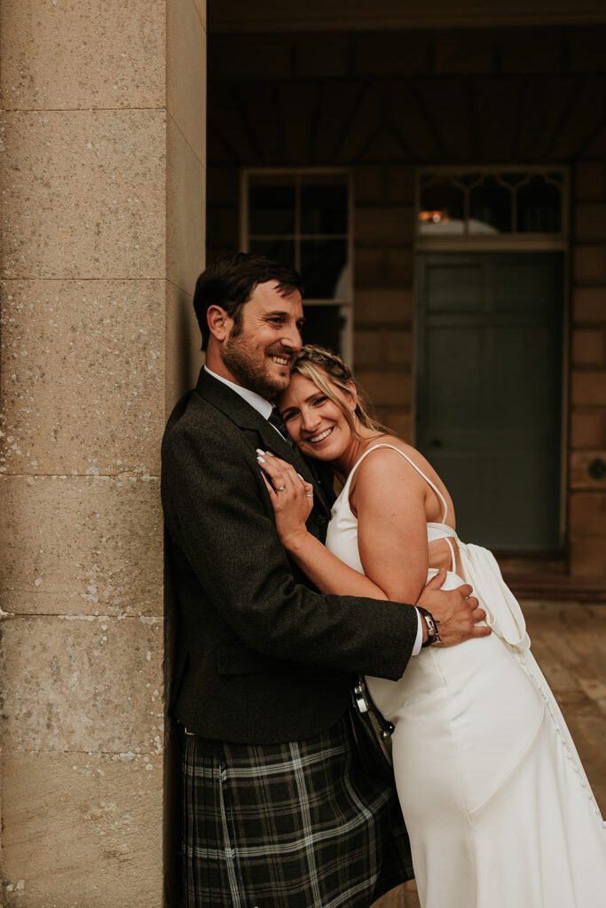 Wedderburn Barns Wedding Couple Cuddling